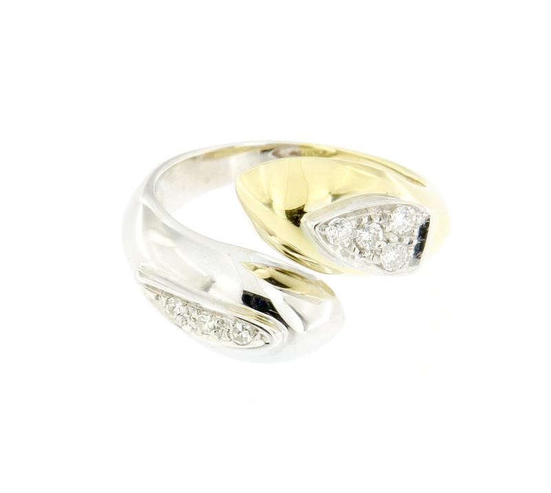 Anello due ori  750/1000 serpe con 7 diamantini taglio brillante
