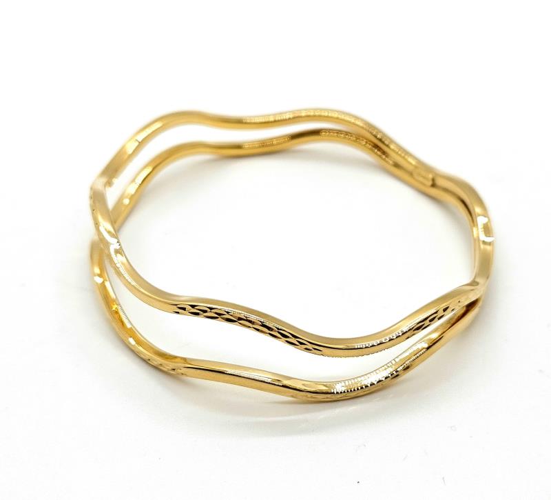 Bracciale  oro giallo 750/1000 rigido ondulato