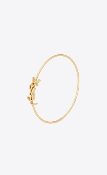 Yves saint laurent bracciale oro giallo 750/1000  con cerniera collezione cassandre