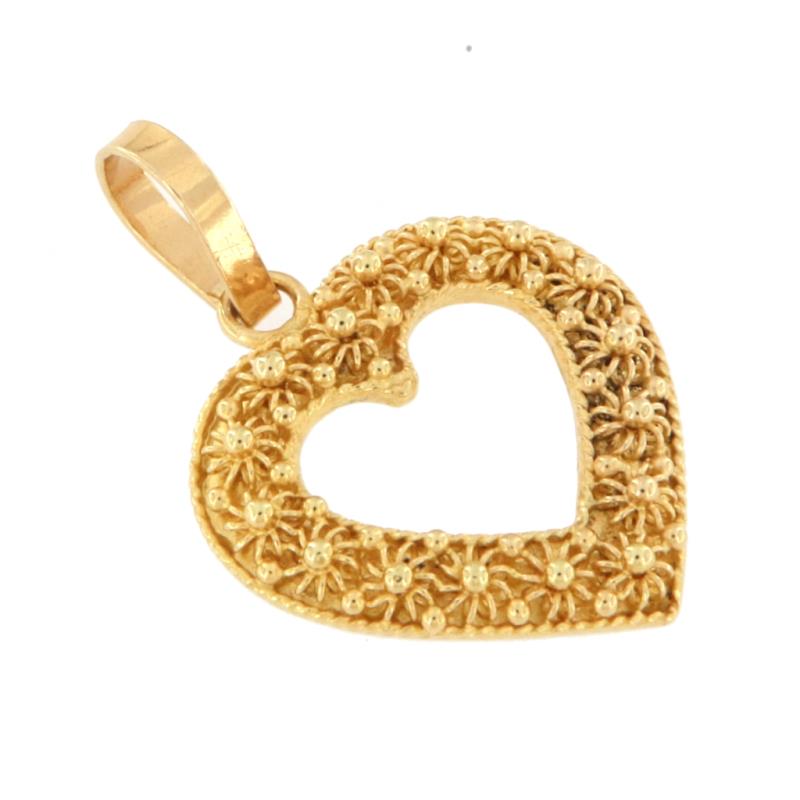 Ciondolo in oro g 750/1000 cuore vuoto dentro filigrana  